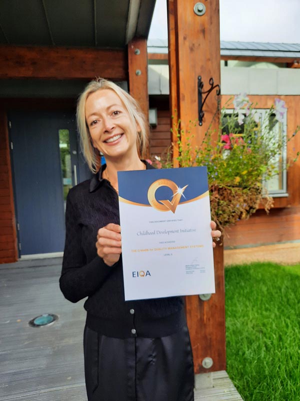 Tara Scott with the Q mark for quality management systems awarded to CDI